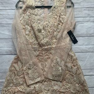 Lulus (brand new) nude, gold, long mesh sleeve romper in a size large